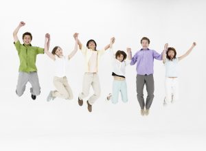 Group of Friends Jumping Together --- Image by © Royalty-Free/Corbis